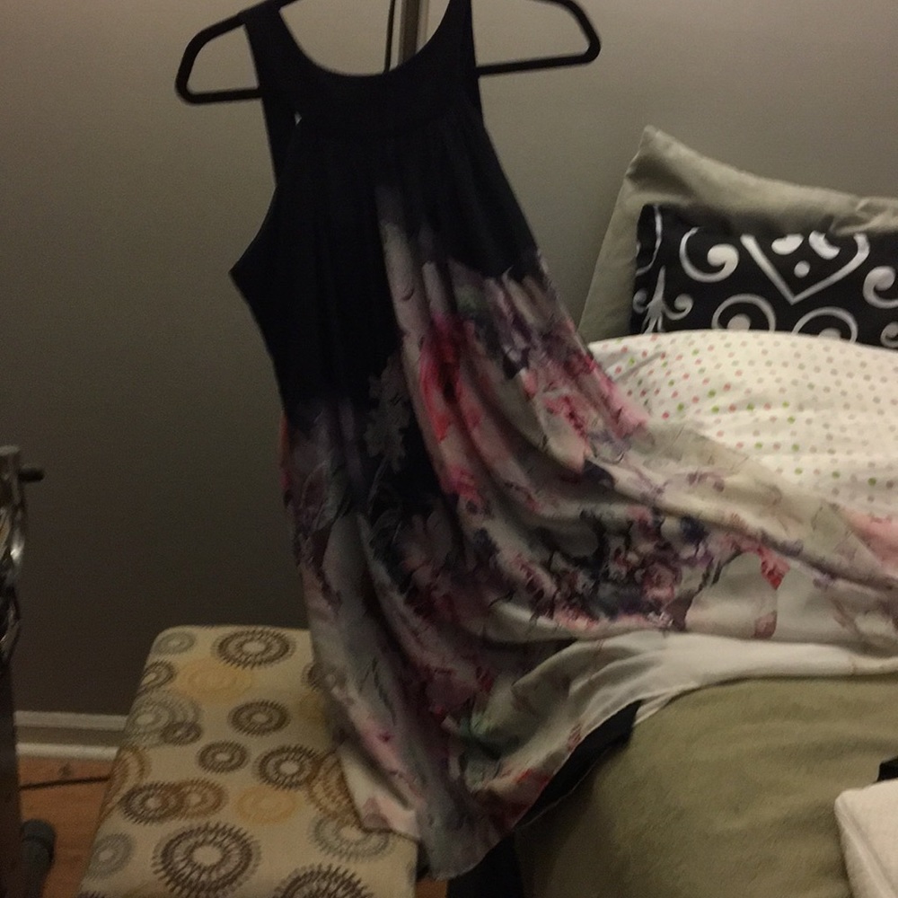 Pretty black dress with floral sheer overlay.